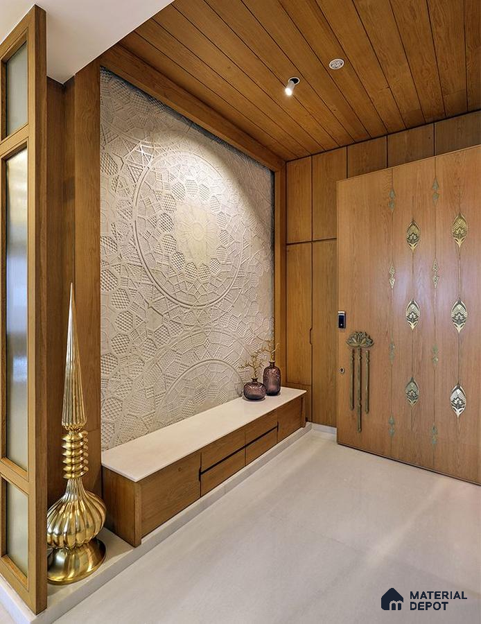 A bathroom with a large tub in the middle of the room and two sinks and two sinks on the wall next to a bathtub in front of a large window that has a wooden flooring is shown in